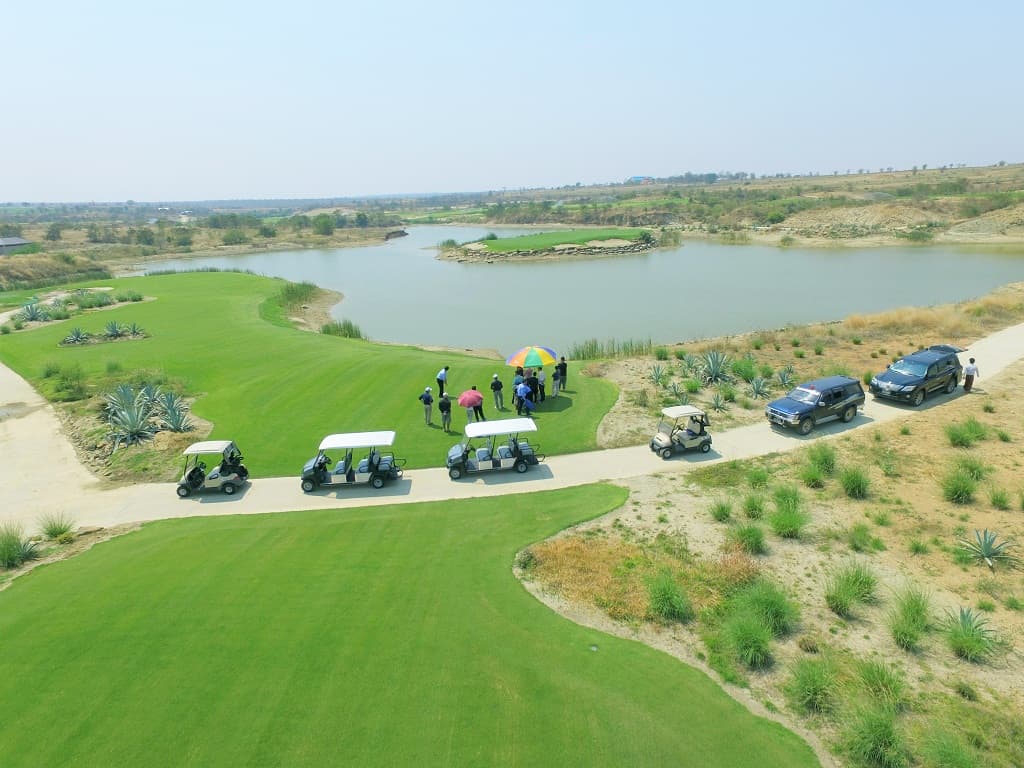 Aerial view of golf carts on course path